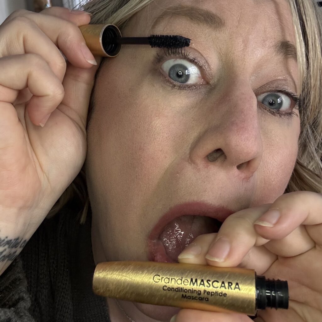 Ginny Dee applies Grande Cosmetics Conditioning Mascara, showing off soft, natural-looking lashes with a hint of volume.