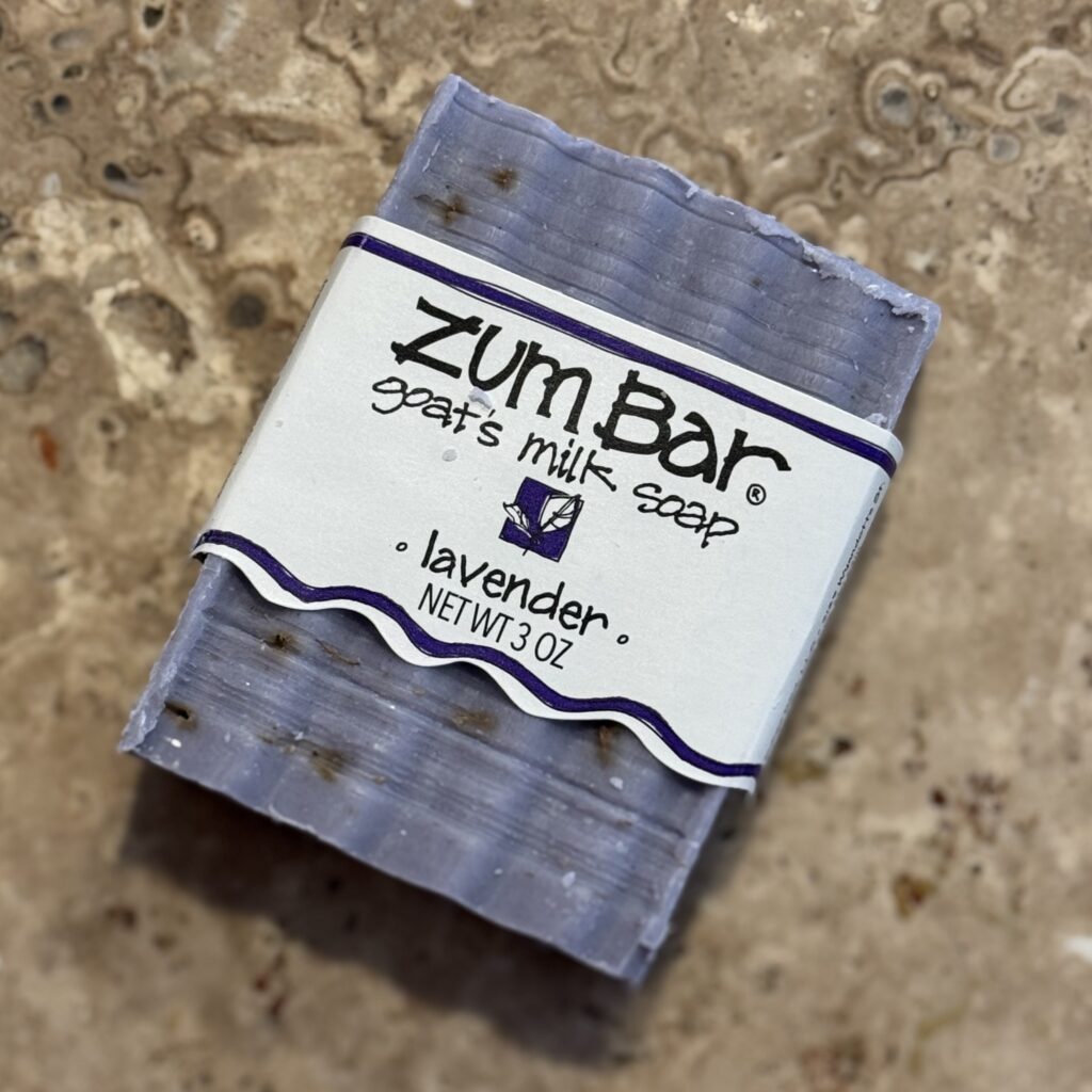 Zum Bar goat’s milk soap with lavender flecks – nourishing travel body soap that conditions skin and adds a spa-like fragrance.