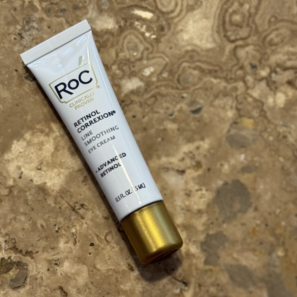 Tube of Roc Retinol Correction Line Smoothing Eye Cream, compact anti-aging eye cream perfect for travel toiletry kits.