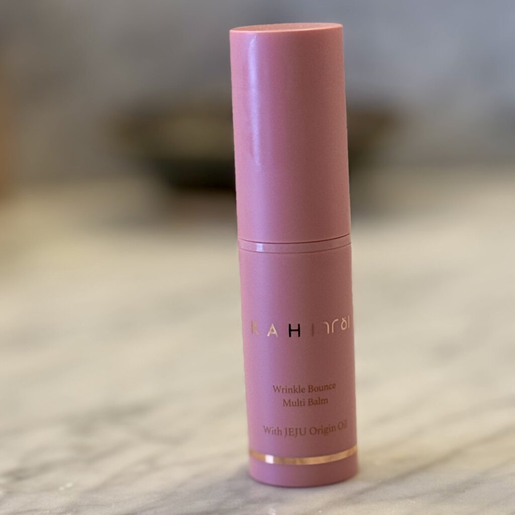 KAHI Wrinkle Bounce Multi Balm Stick – hydrating multi-use travel skincare balm photographed by Ginny Dee.