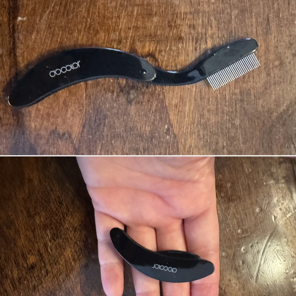 Ginny Dee holds the Docolor foldable eyelash comb, showing its pocket-sized design for de-clumping mascara.