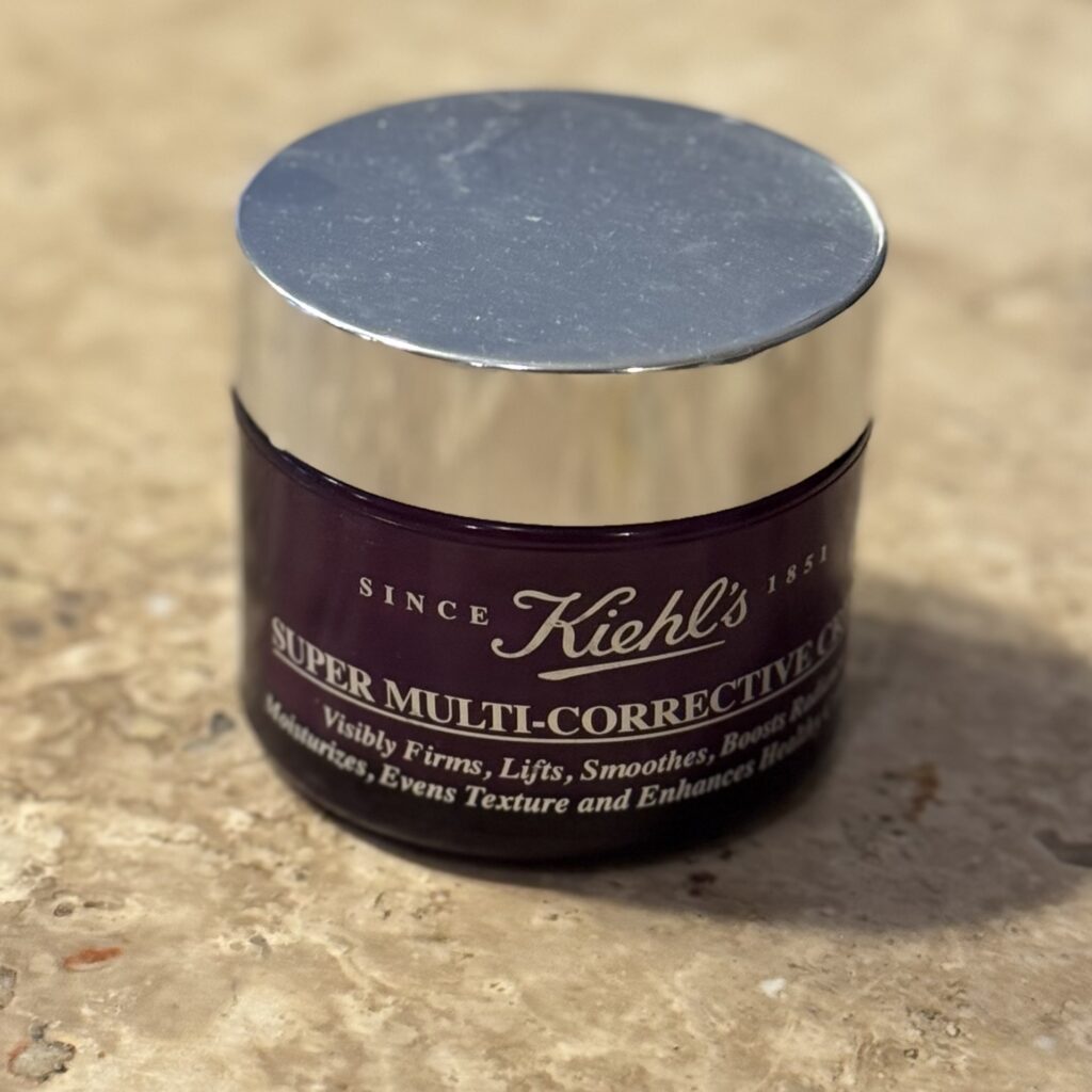 Kiehl’s Super Multi-Corrective Cream travel-size jar — a rich, concentrated night cream that firms, smooths, and moisturizes for radiant skin on the go.