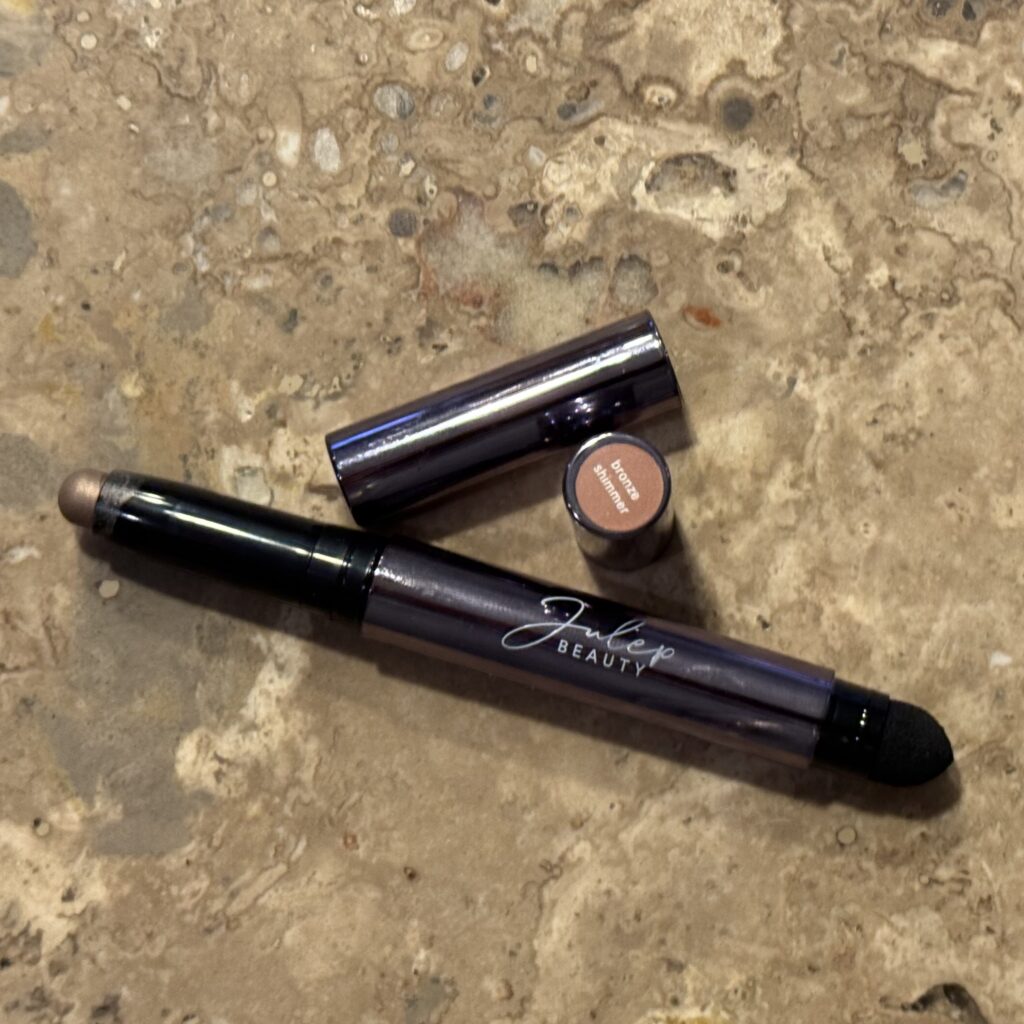 Julep Eyeshadow 101 stick , showing how the built-in smudger and creme-to-powder shadow come in one compact wand.