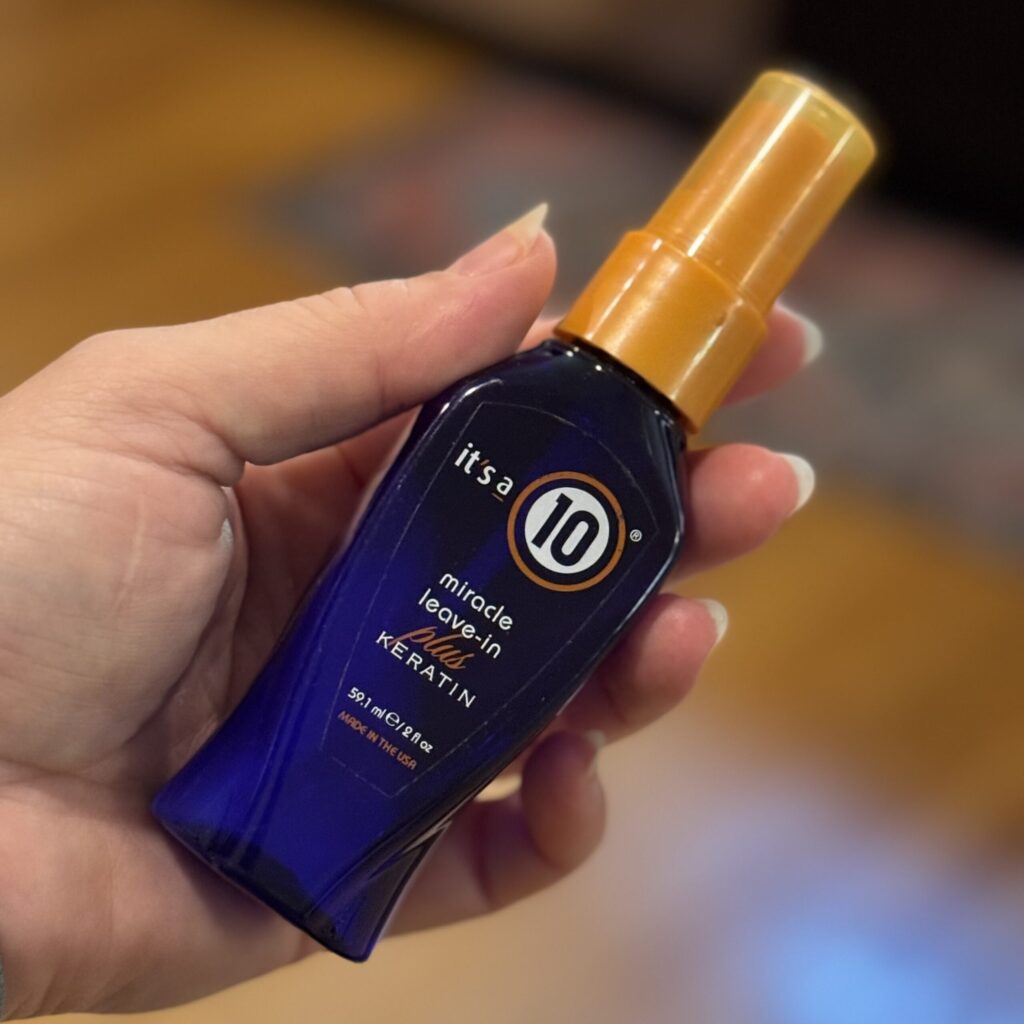 It’s a 10 Miracle Leave-In Plus Keratin in 2oz travel size — lightweight hair treatment that detangles, strengthens, and adds shine without weighing down fine hair.