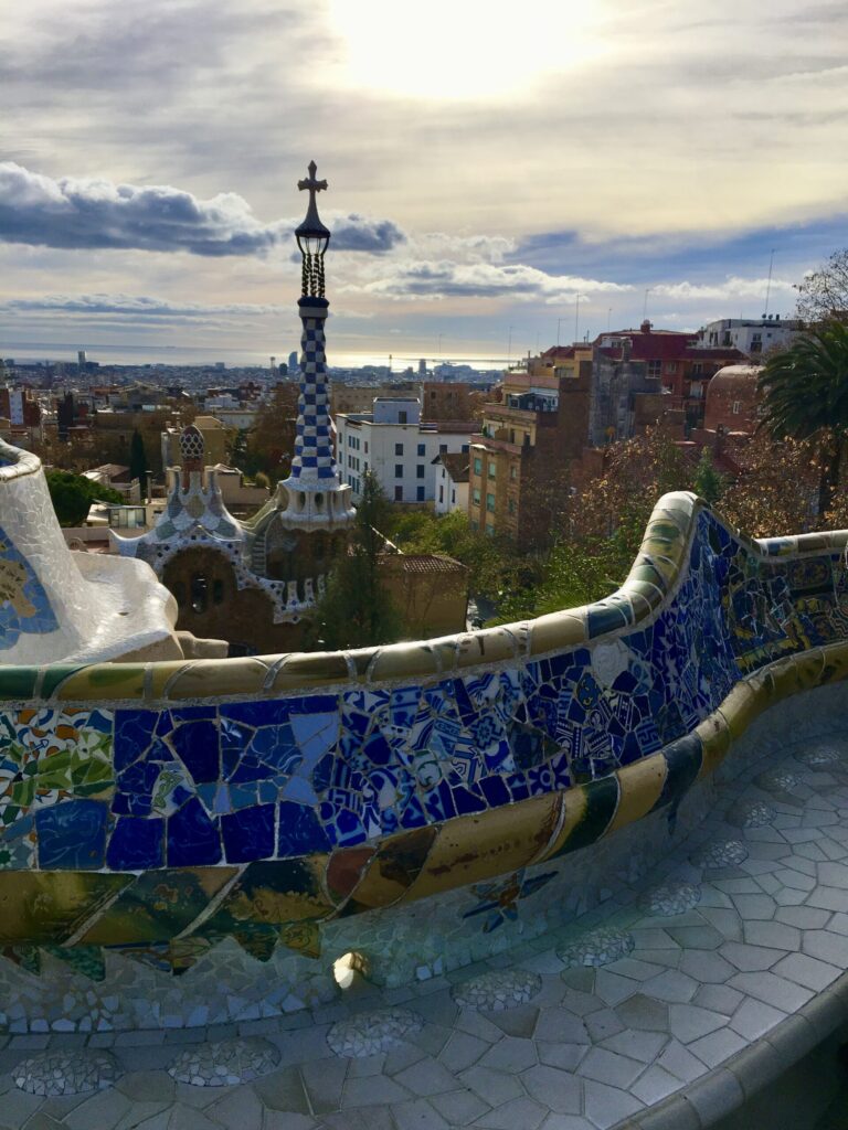 The view over Barcelona from Park Güell, including a survey mosaic-tiled bench.